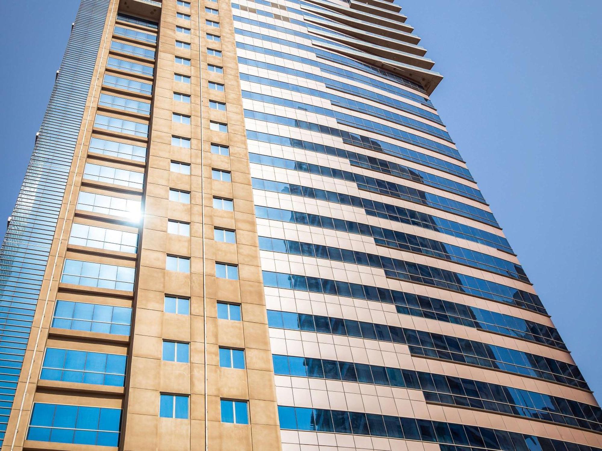 迪拜朱美拉湖塔楼普尔曼酒店 外观 照片 The building
